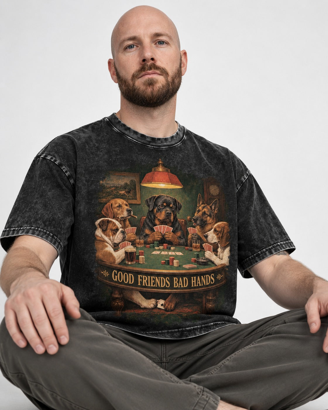 Rottweiler Good Friends Bad Hands Poker Night Graphic Washed Tee in Black, worn by a seated model