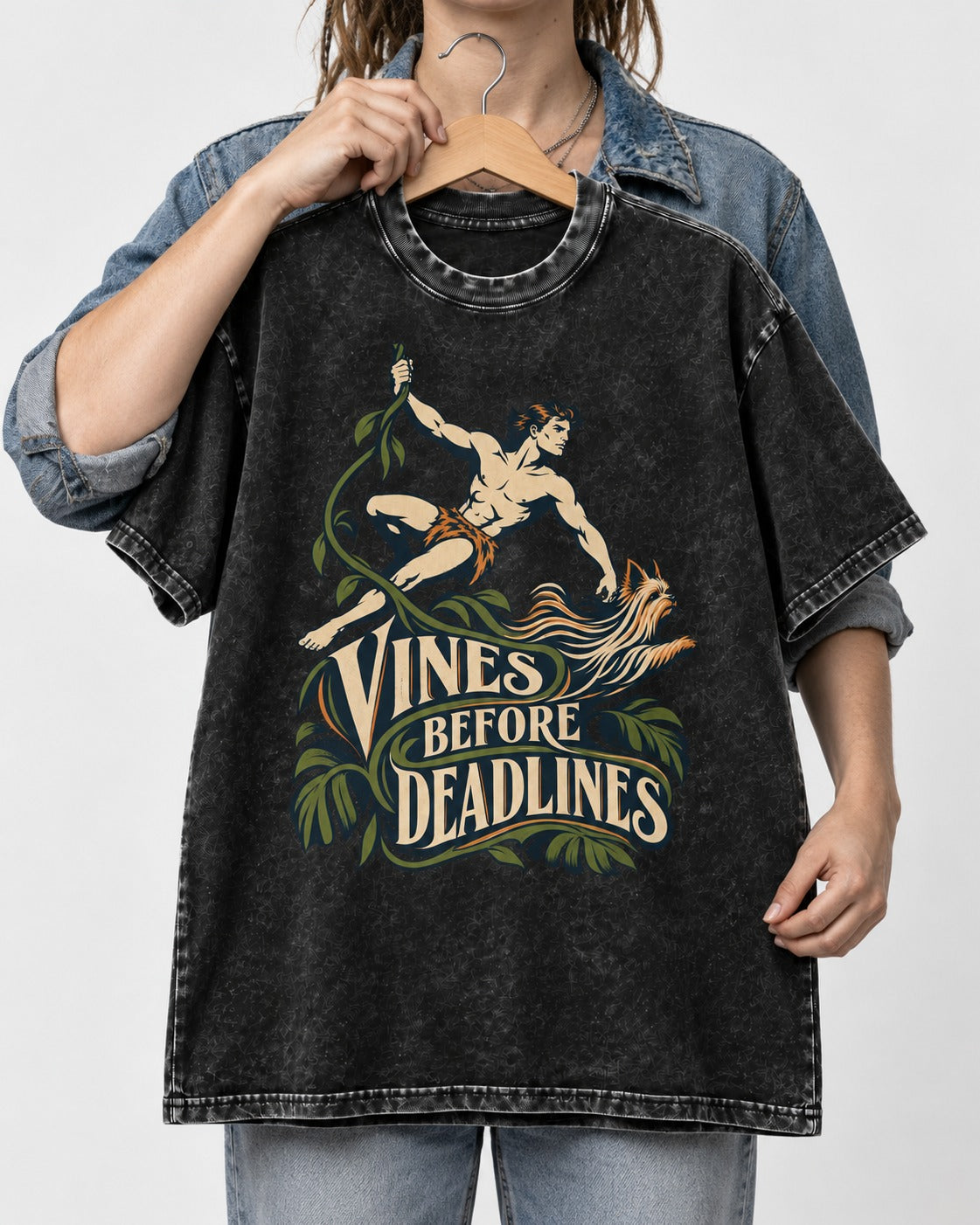Yorkshire Terrier Vines Before Deadlines Jungle Hero Graphic Washed Tee in Black, held up on a hanger