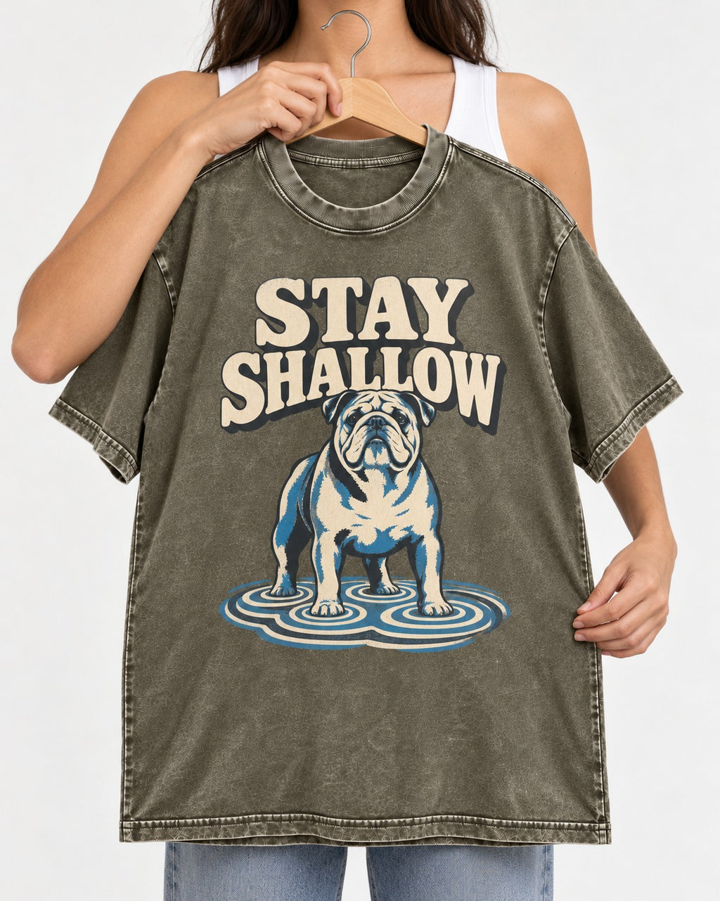 English Bulldog Stay Shallow Ripple Graphic Washed Tee in Army Green, held up on a hanger