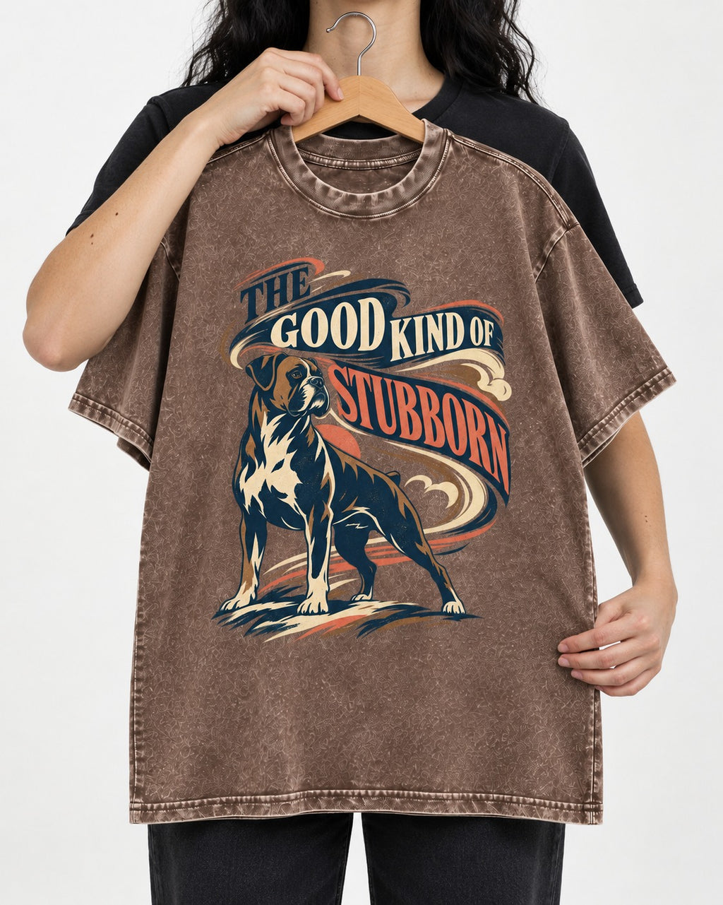 Boxer The Good Kind of Stubborn Washed Tee in Coffee, held up on a hanger