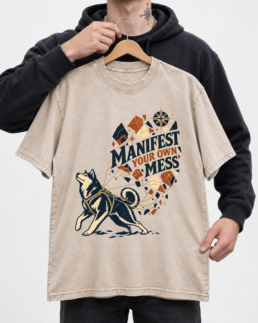 Husky Manifest Your Own Mess Washed Tee in Apricot, held up on a hanger