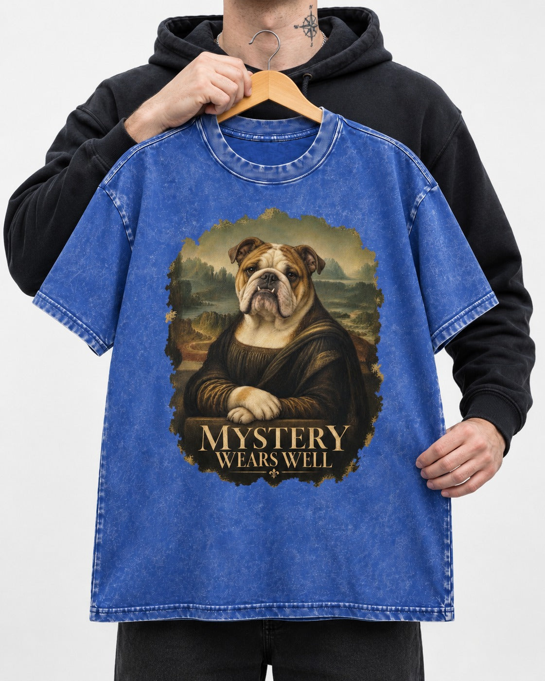 English Bulldog Mystery Wears Well Mona Lisa Portrait Washed Tee in Royal Blue, held up on a hanger