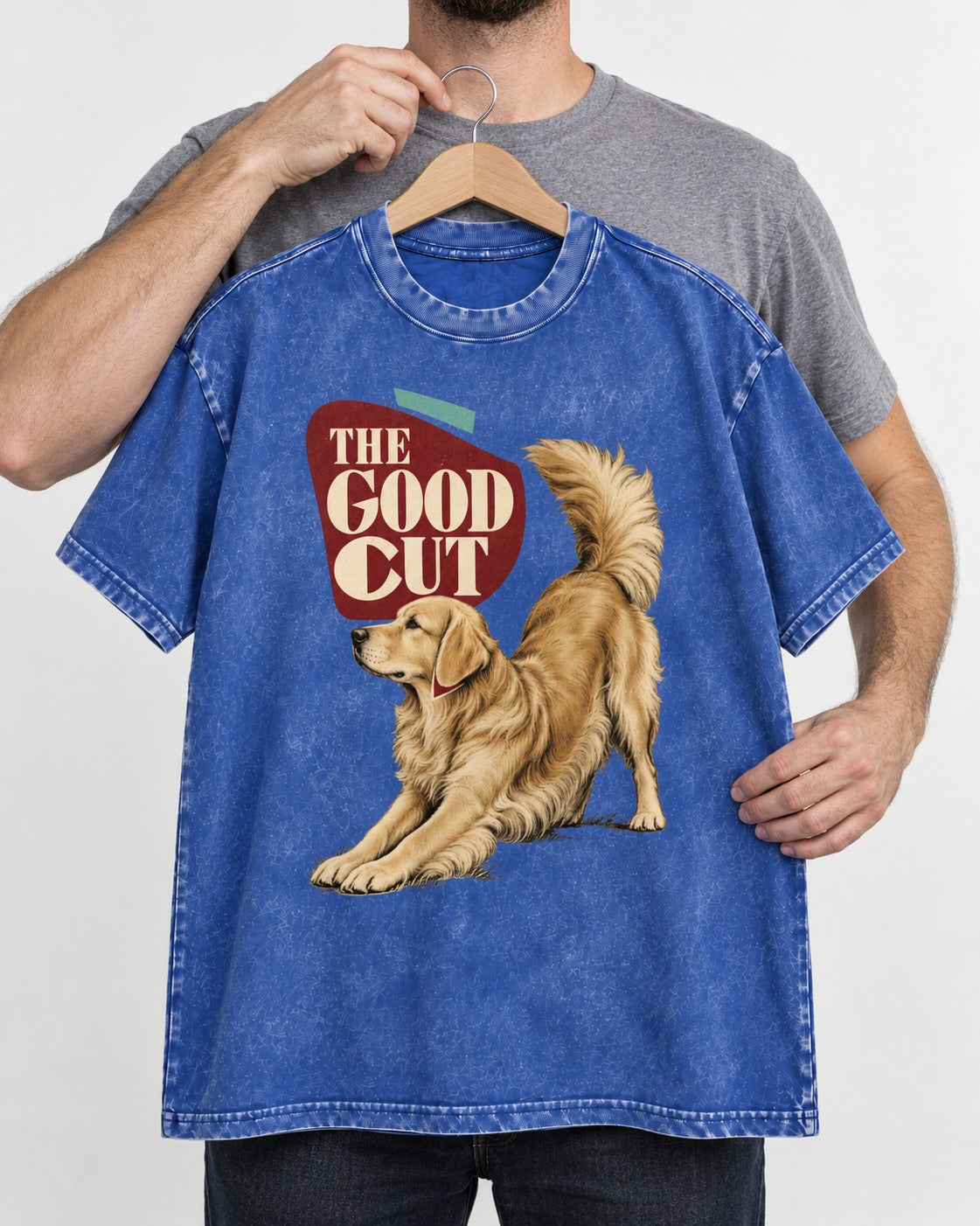 Golden Retriever The Good Cut Play Bow Graphic Washed Tee in Royal Blue, held up on a hanger