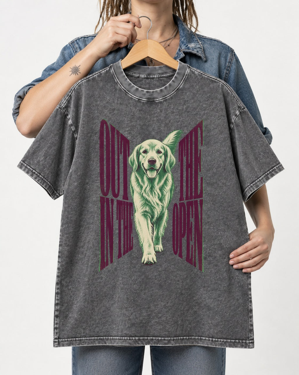 Golden Retriever Out in the Open Washed Tee in Gray, held up on a hanger