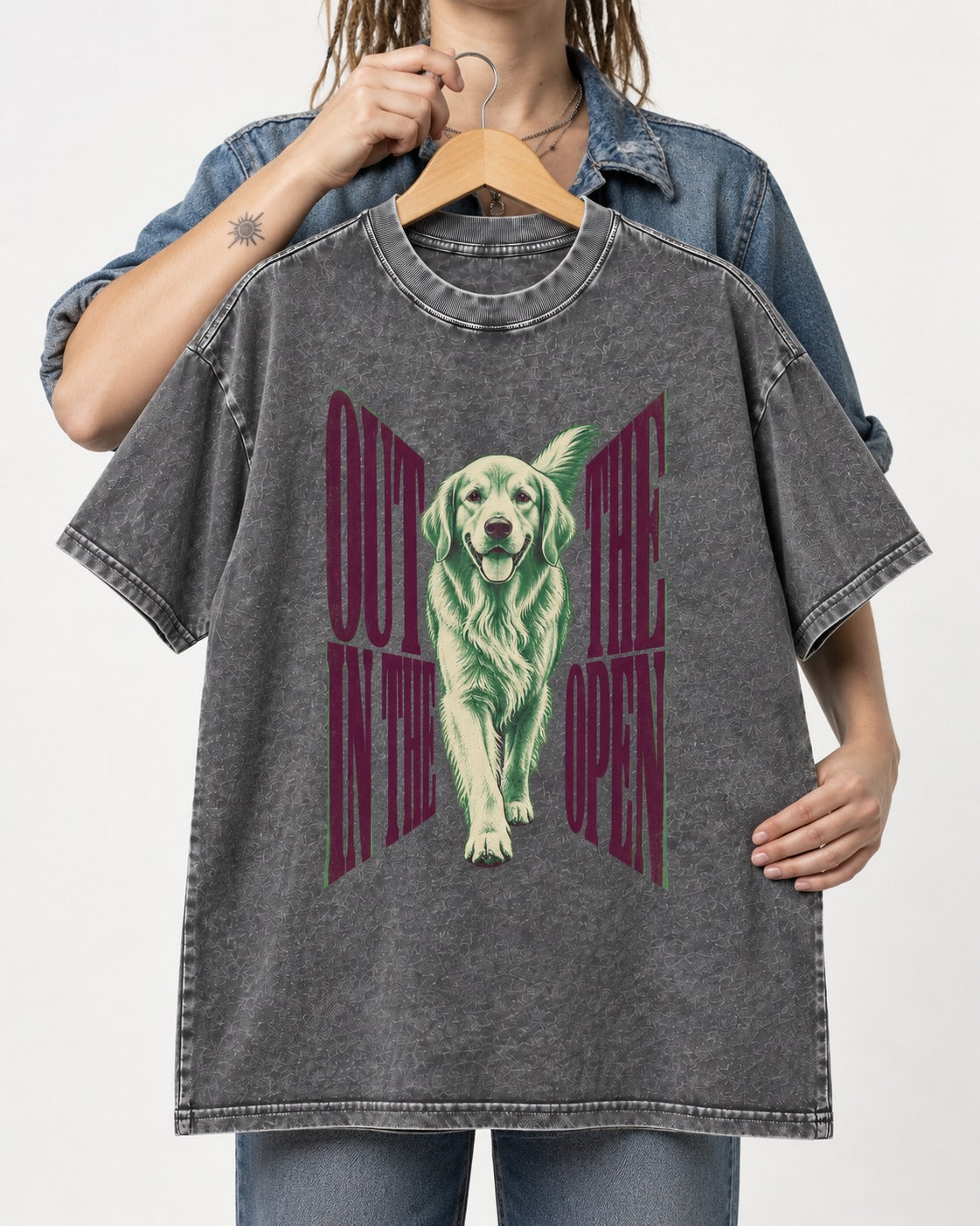 Golden Retriever Out in the Open Washed Tee in Gray, held up on a hanger