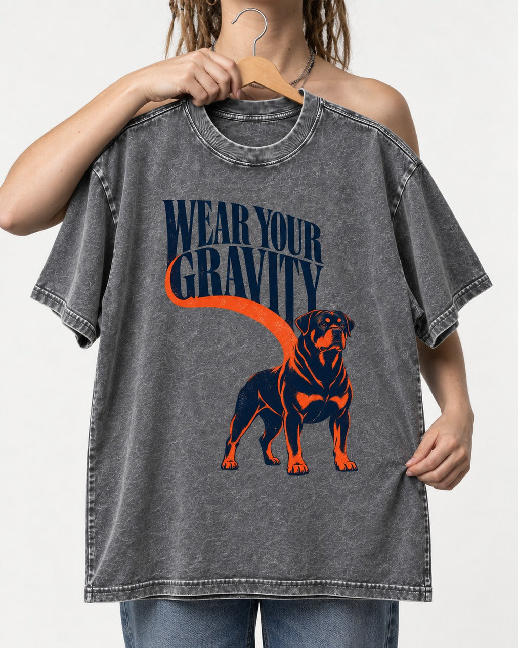 Wear Your Gravity Rottweiler Washed Tee in Gray, held up on a hanger