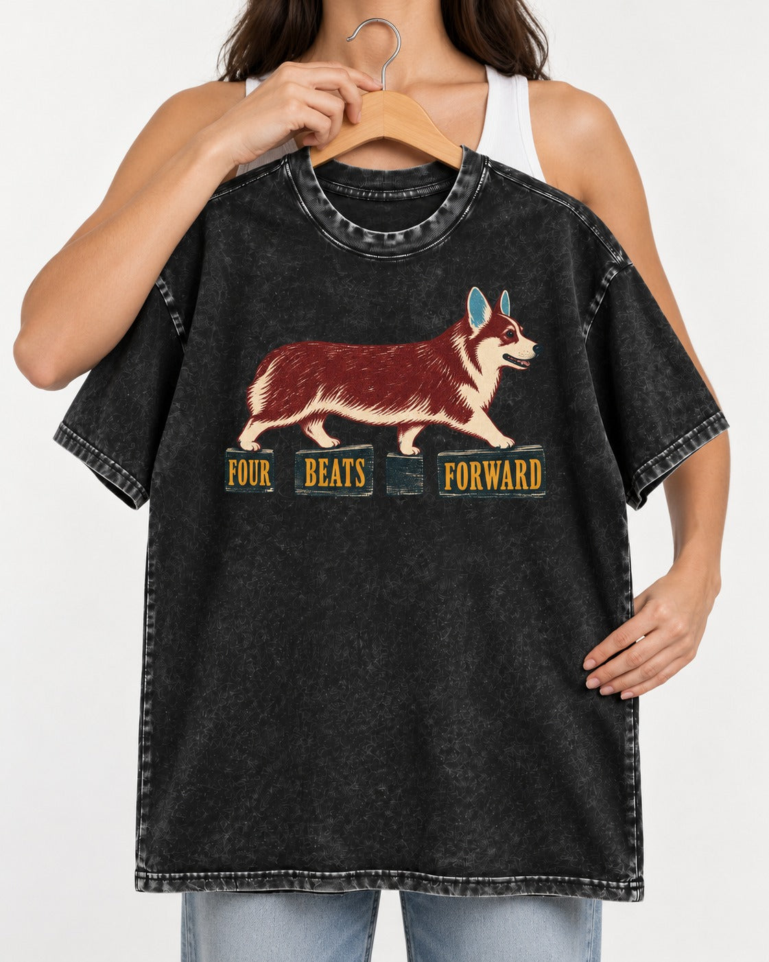 Corgi Four Beats Forward Washed Tee in Black, held up on a hanger