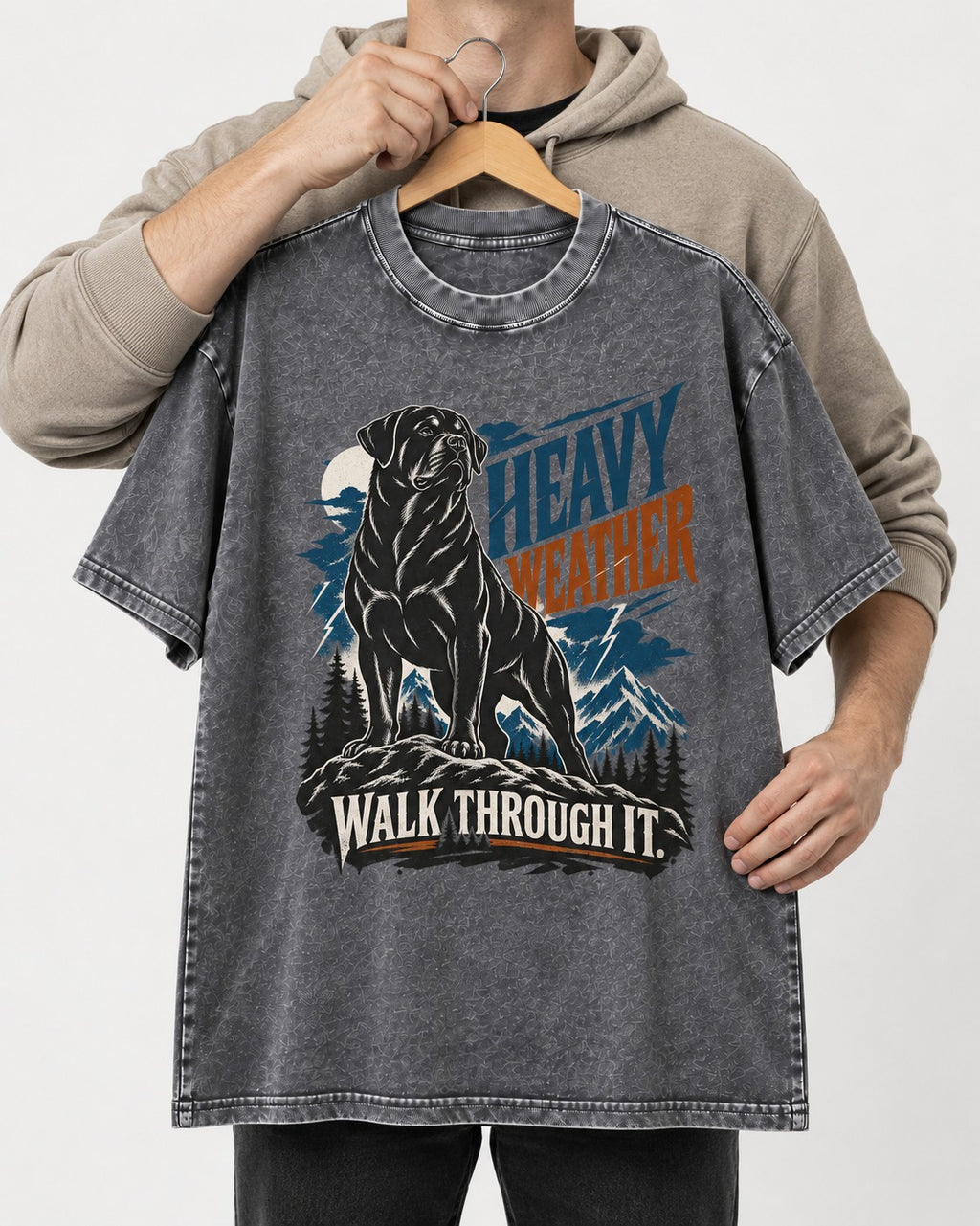 Heavy Weather Rottweiler Washed Tee in Gray, held up on a hanger
