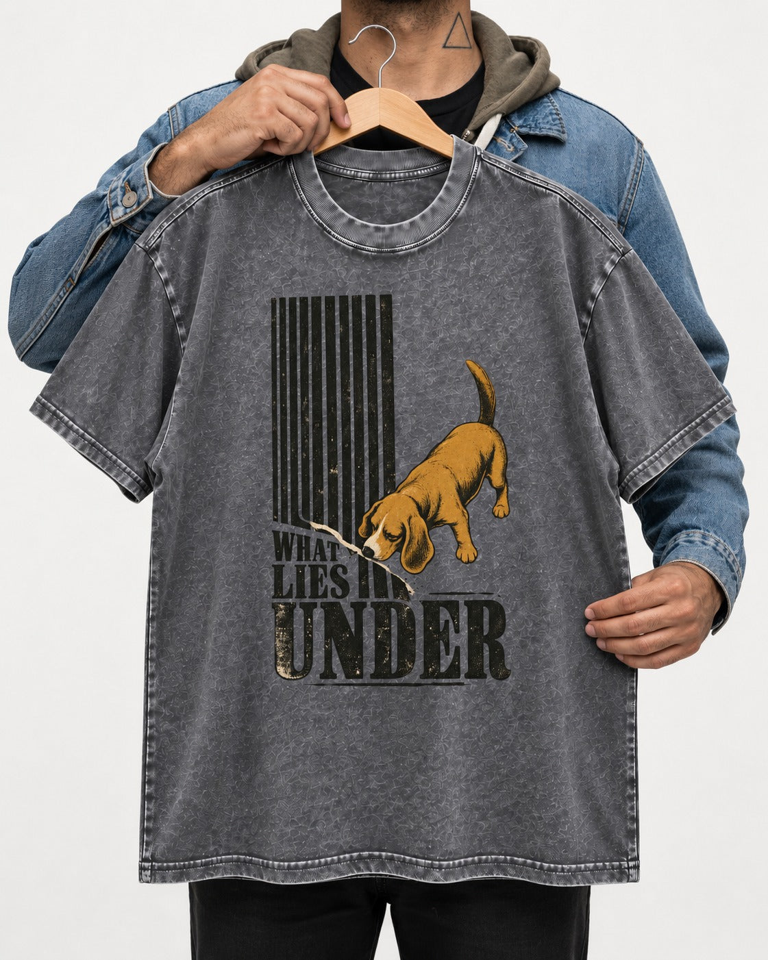 Beagle Knows What Lies Under Washed Tee in Gray, held up on a hanger