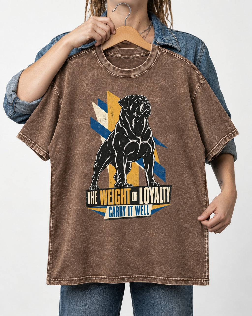 Rottweiler Weight of Loyalty Washed Tee in Coffee, held up on a hanger