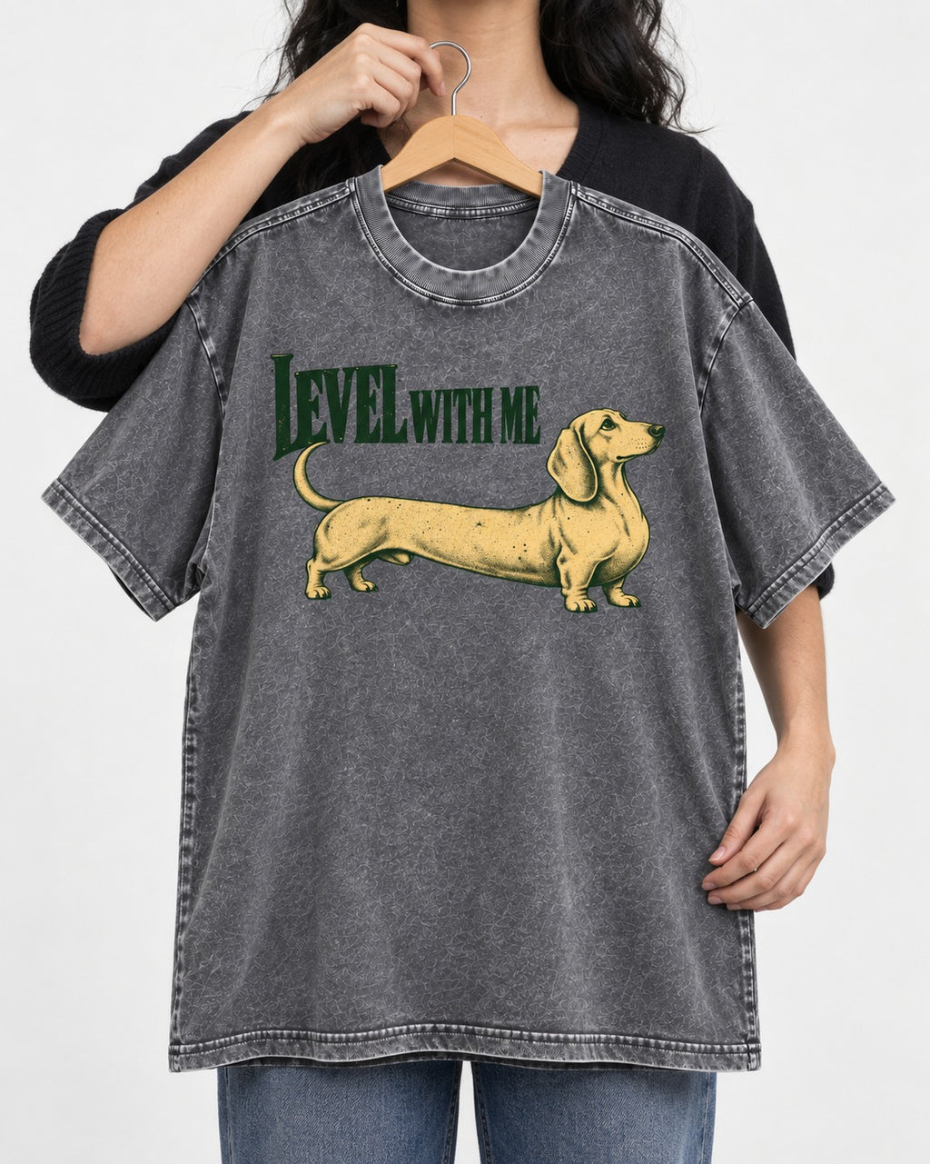 Dachshund Level with Me Washed Tee in Gray, held up on a hanger