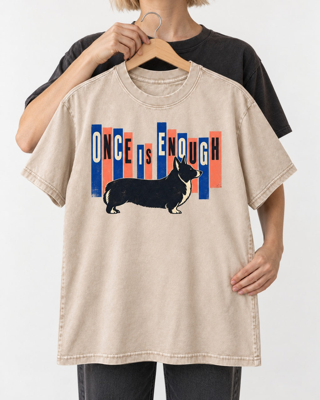 Corgi Once Is Enough Washed Tee in Apricot, held up on a hanger