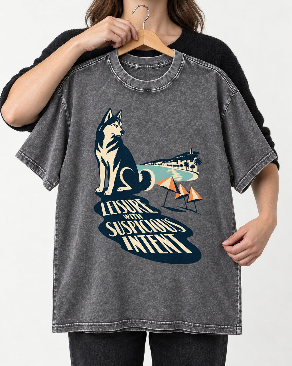 Husky Leisure with Suspicious Intent Washed Tee in Gray, held up on a hanger