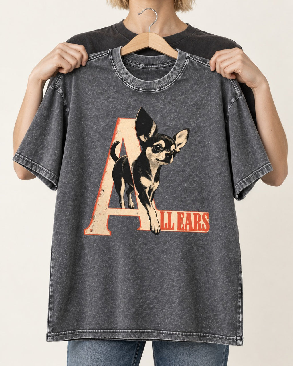 All Ears Chihuahua Washed Tee in Gray, held up on a hanger