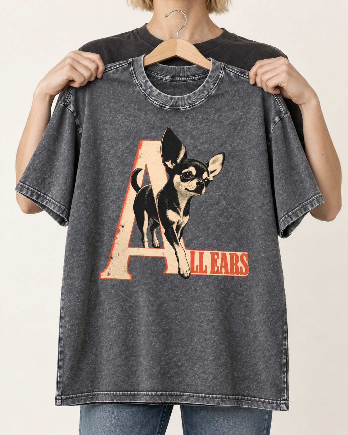 All Ears Chihuahua Washed Tee in Gray, held up on a hanger