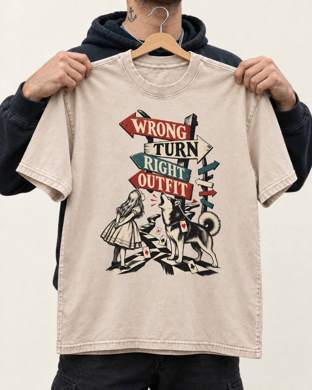 Husky Wrong Turn Right Outfit Wonderland Signpost Graphic Washed Tee in Apricot, held up on a hanger