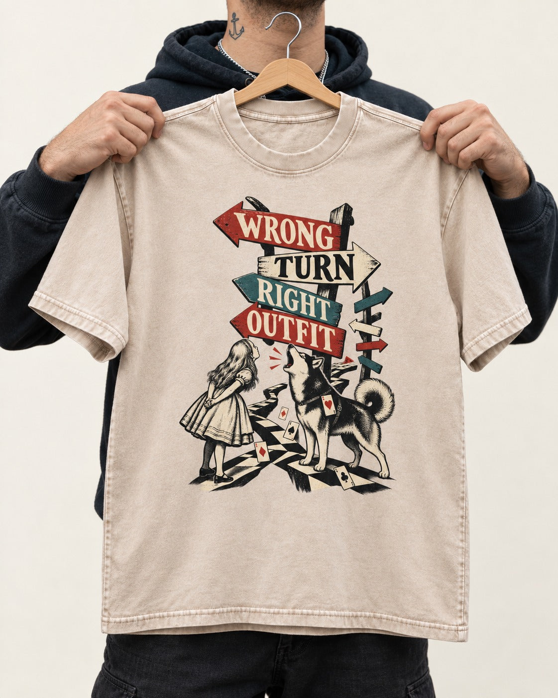 Husky Wrong Turn Right Outfit Wonderland Signpost Graphic Washed Tee in Apricot, held up on a hanger