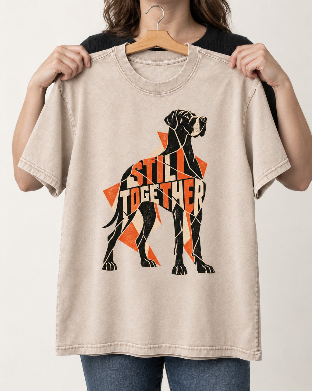 Great Dane Still Together Geometric Mosaic Graphic Washed Tee in Apricot, held up on a hanger