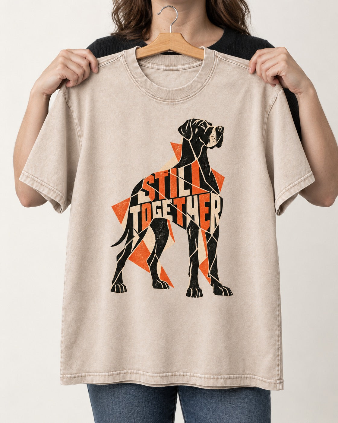 Great Dane Still Together Geometric Mosaic Graphic Washed Tee in Apricot, held up on a hanger