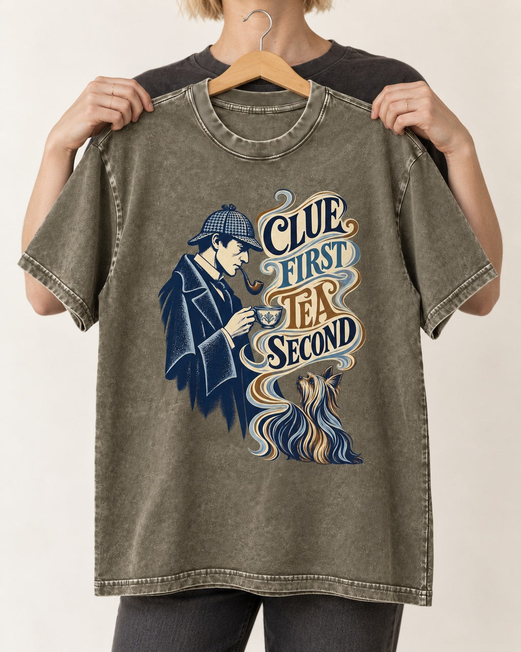 Yorkshire Terrier Clue First Tea Second Detective Graphic Washed Tee in Army Green, held up on a hanger