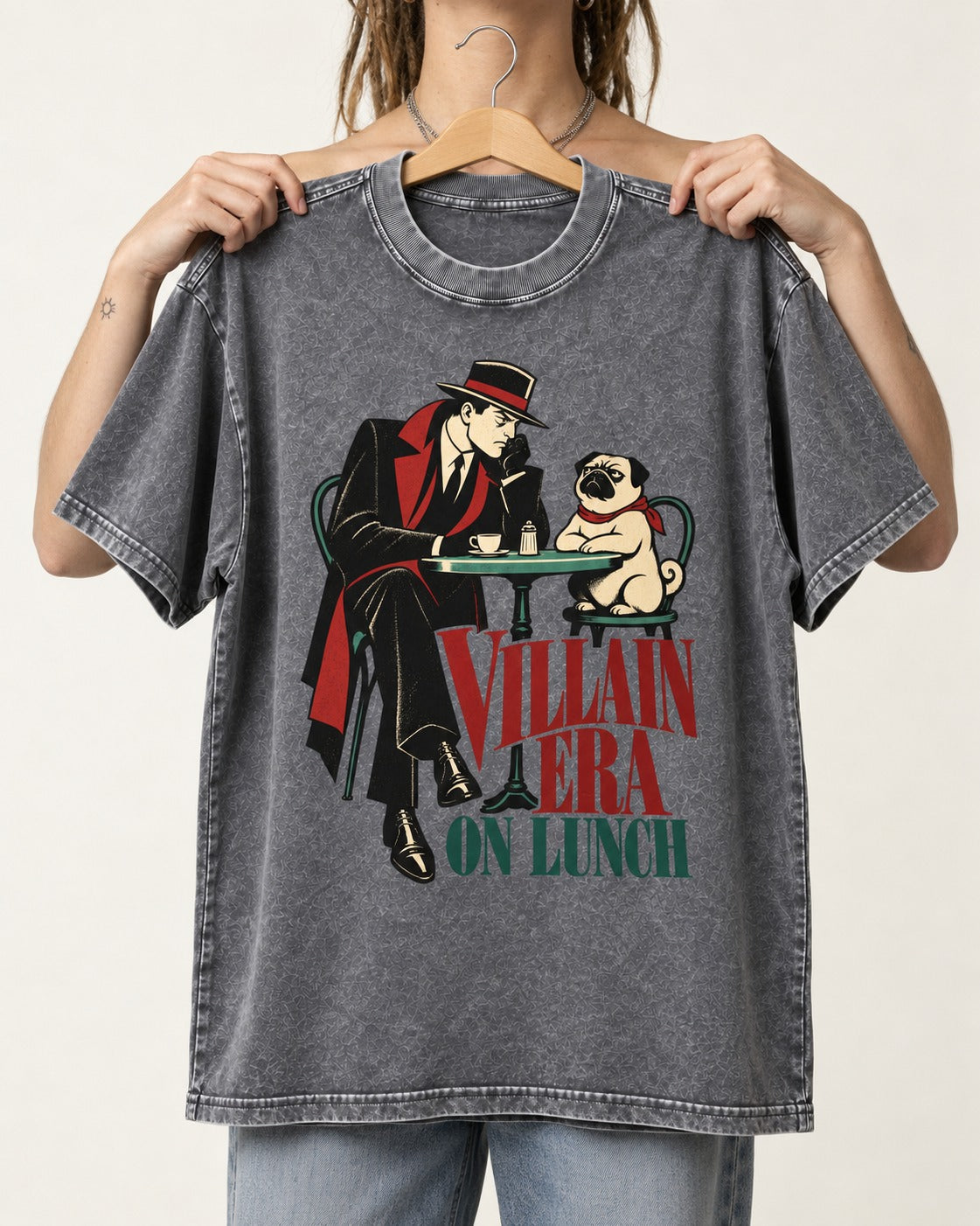 Pug Villain Era Washed Tee in Gray, held up on a hanger