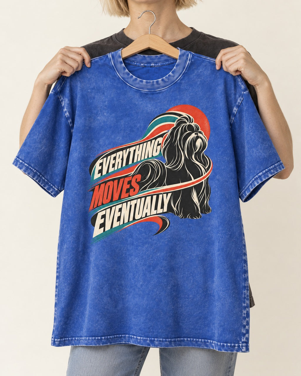 Shih Tzu Everything Moves Eventually Retro Speed Graphic Washed Tee in Royal Blue, held up on a hanger