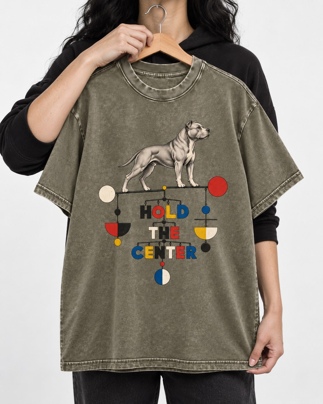 Pitbull Hold the Center Balance Mobile Graphic Washed Tee in Army Green, held up on a hanger