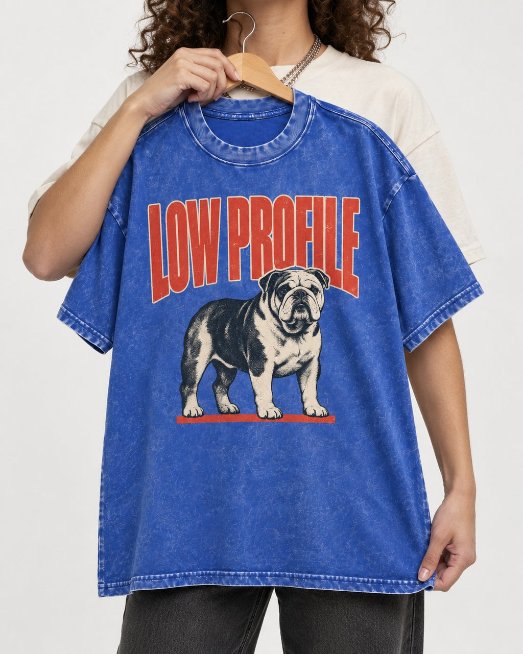 English Bulldog Low Profile Standing Graphic Washed Tee in Royal Blue, held up on a hanger