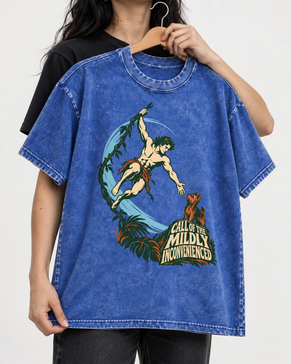 Yorkshire Terrier Call of the Mildly Inconvenienced Vine Swing Graphic Washed Tee in Royal Blue, held up on a hanger