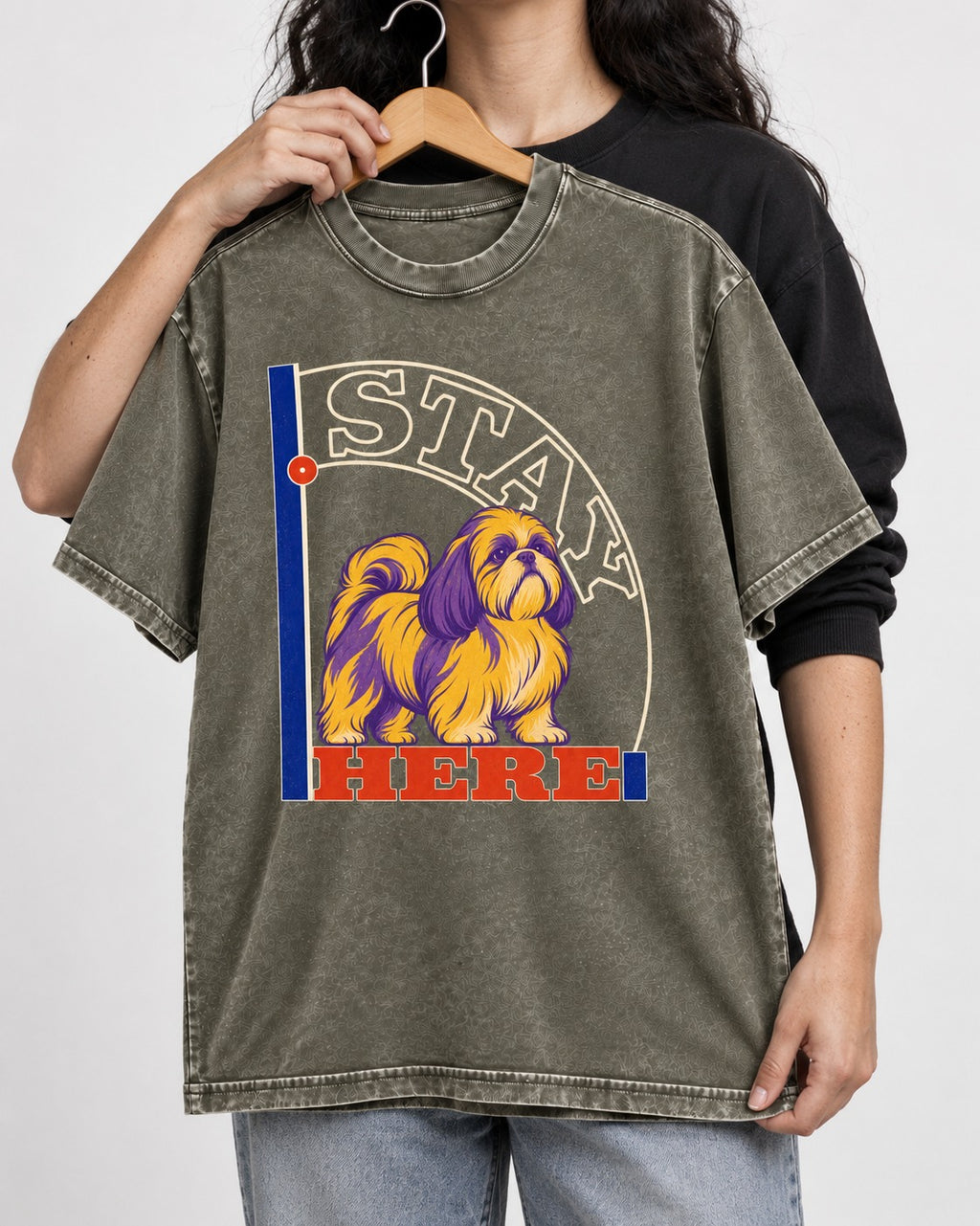Shih Tzu Stay Here Semicircle Sign Graphic Washed Tee in Army Green, held up on a hanger