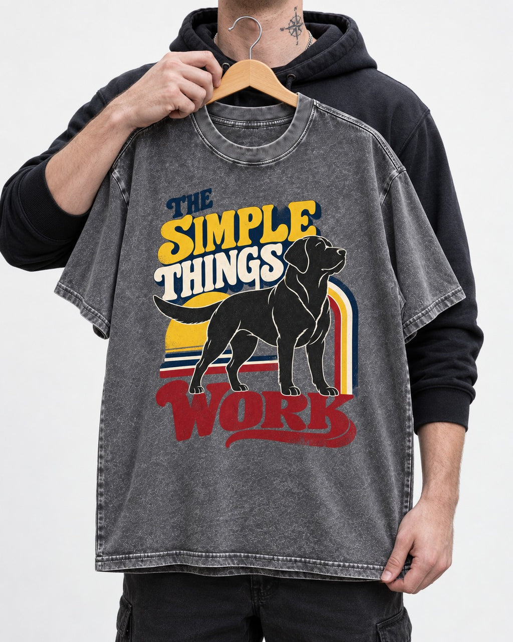 The Simple Things Work Labrador Retriever Washed Tee in Gray, held up on a hanger