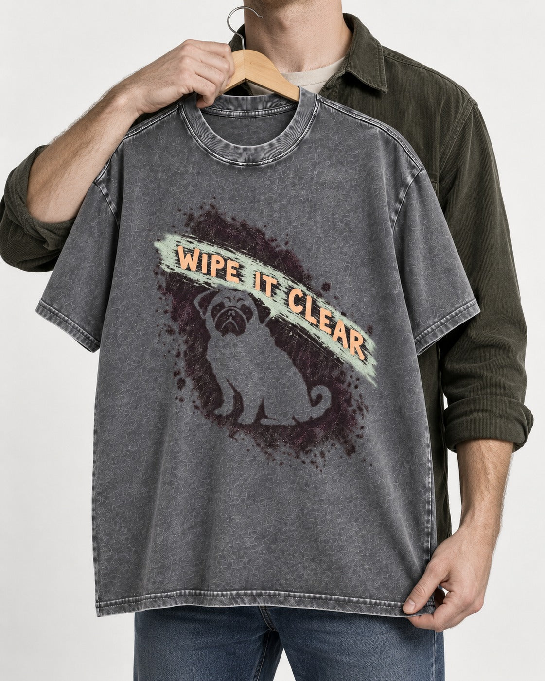 Pug Wipe It Clear Washed Tee in Gray, held up on a hanger