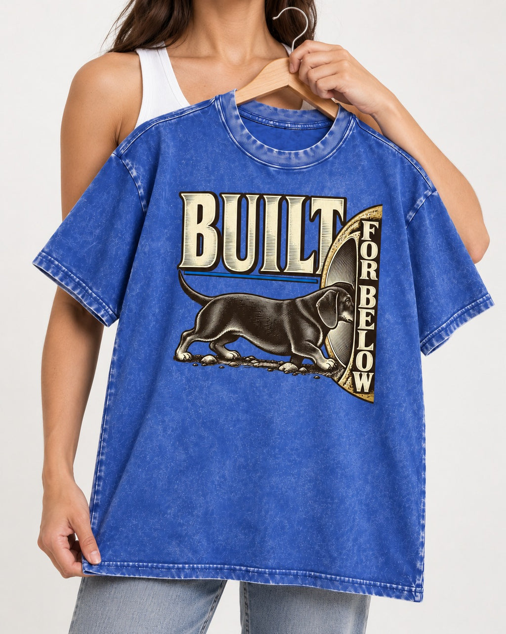 Dachshund Built for Below Vintage Burrow Graphic Washed Tee in Royal Blue, held up on a hanger
