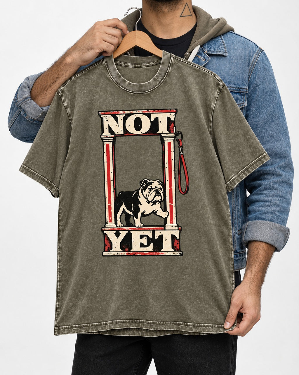 English Bulldog Not Yet Doorway Graphic Washed Tee in Army Green, held up on a hanger