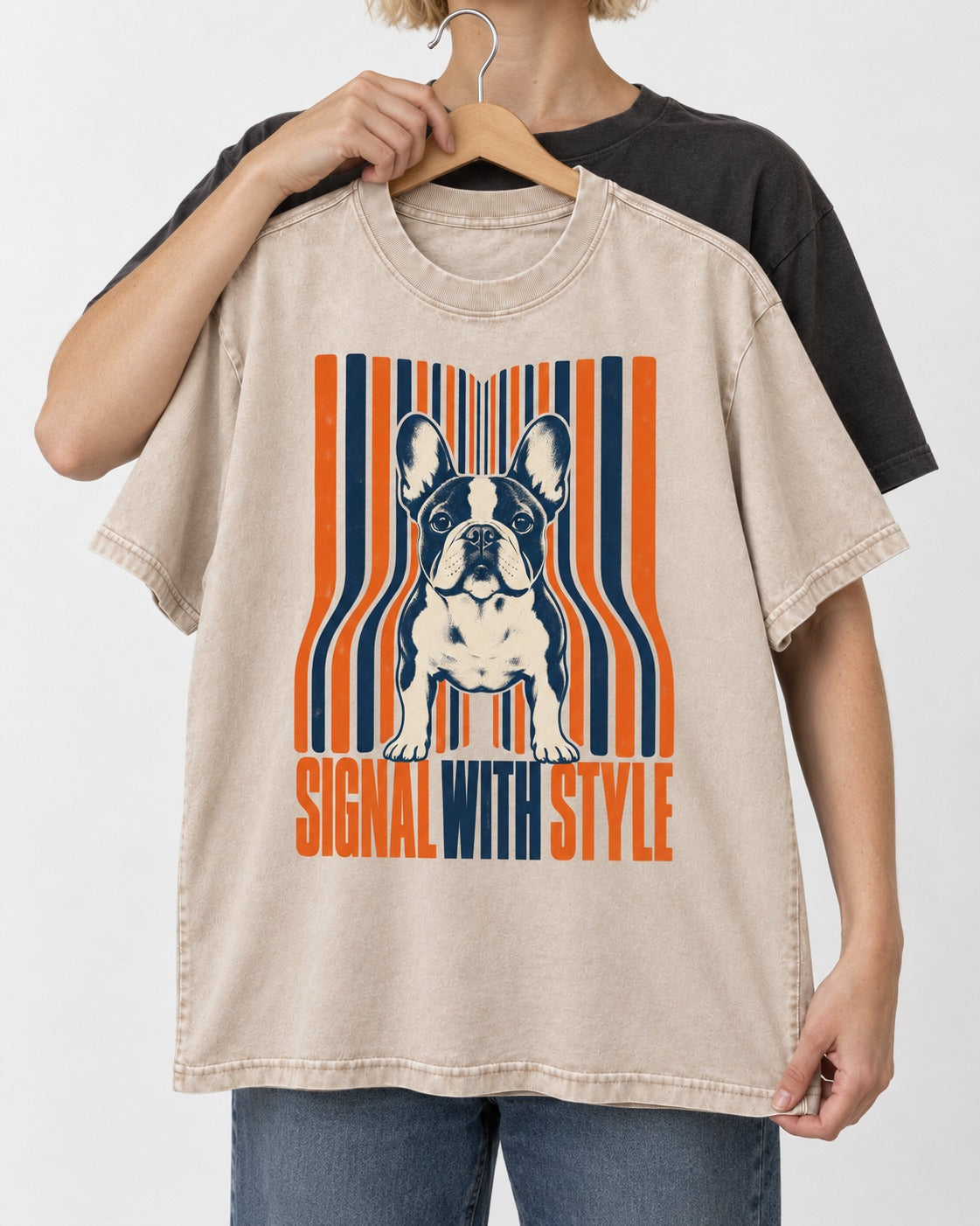Frenchie Signal Washed Tee in Apricot, held up on a hanger