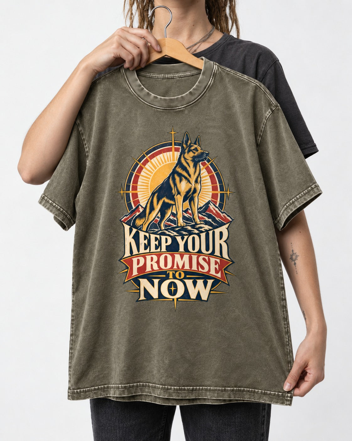 Keep Your Promise To Now Sunrise German Shepherd Dog Graphic Washed Tee in Army Green, held up on a hanger