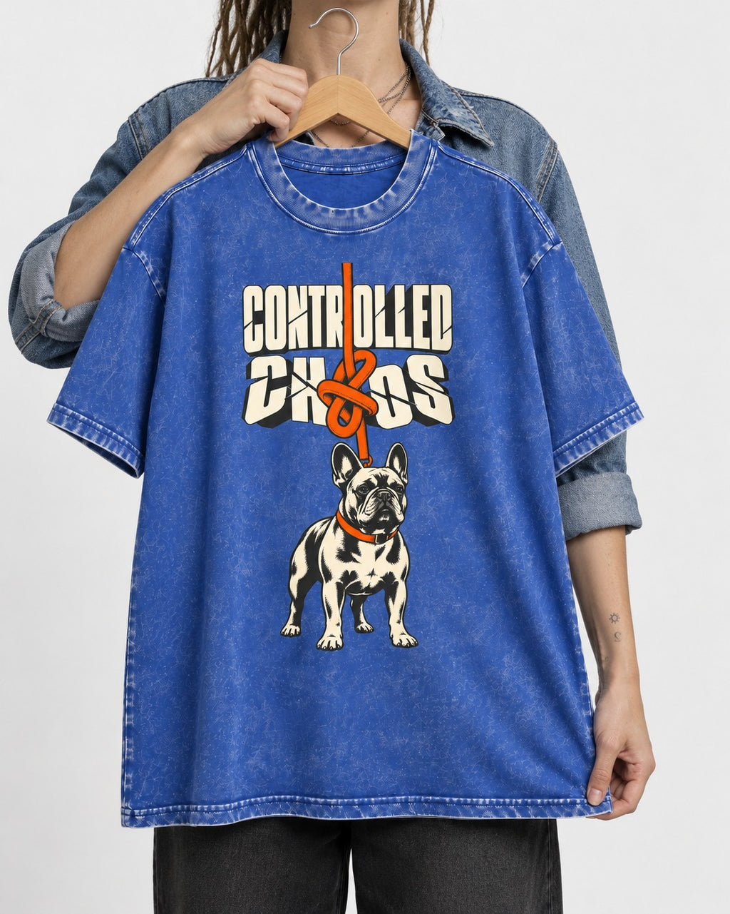 Frenchie Controlled Chaos Leash Knot Graphic Washed Tee in Royal Blue, held up on a hanger