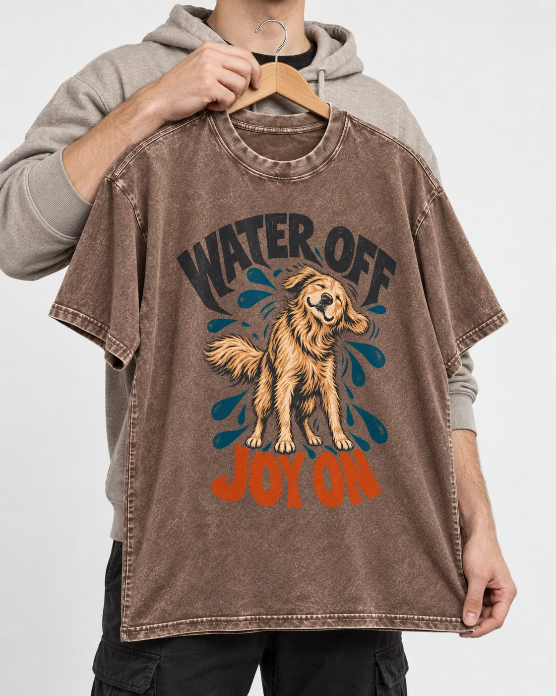 Water Off Joy on Golden Retriever Washed Tee in Coffee, held up on a hanger