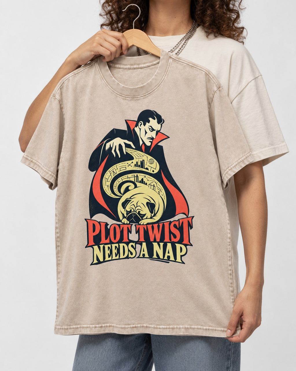 Pug Needs a Nap Washed Tee in Apricot, held up on a hanger
