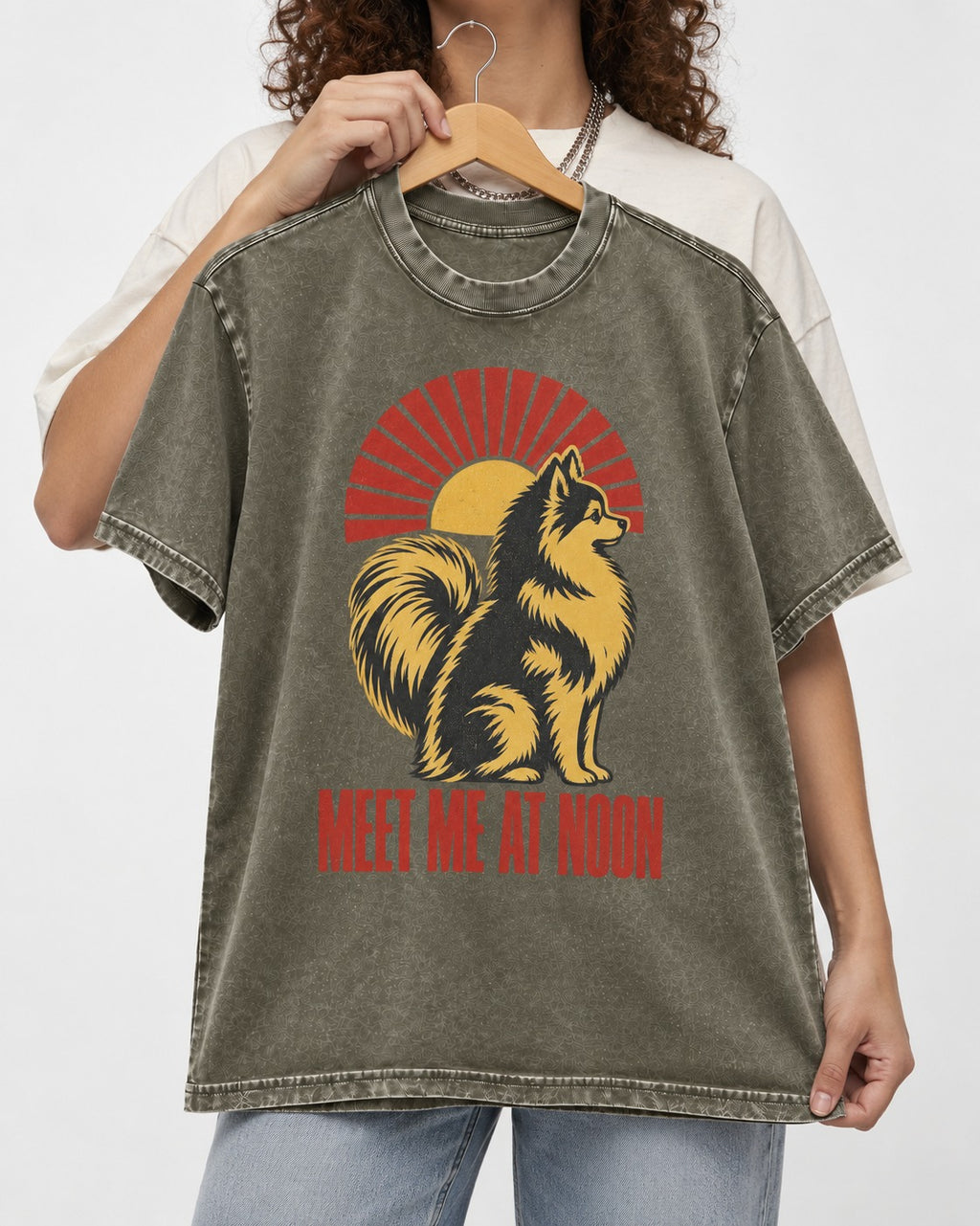 Pomeranian Meet Me at Noon Sunburst Graphic Washed Tee in Army Green, held up on a hanger