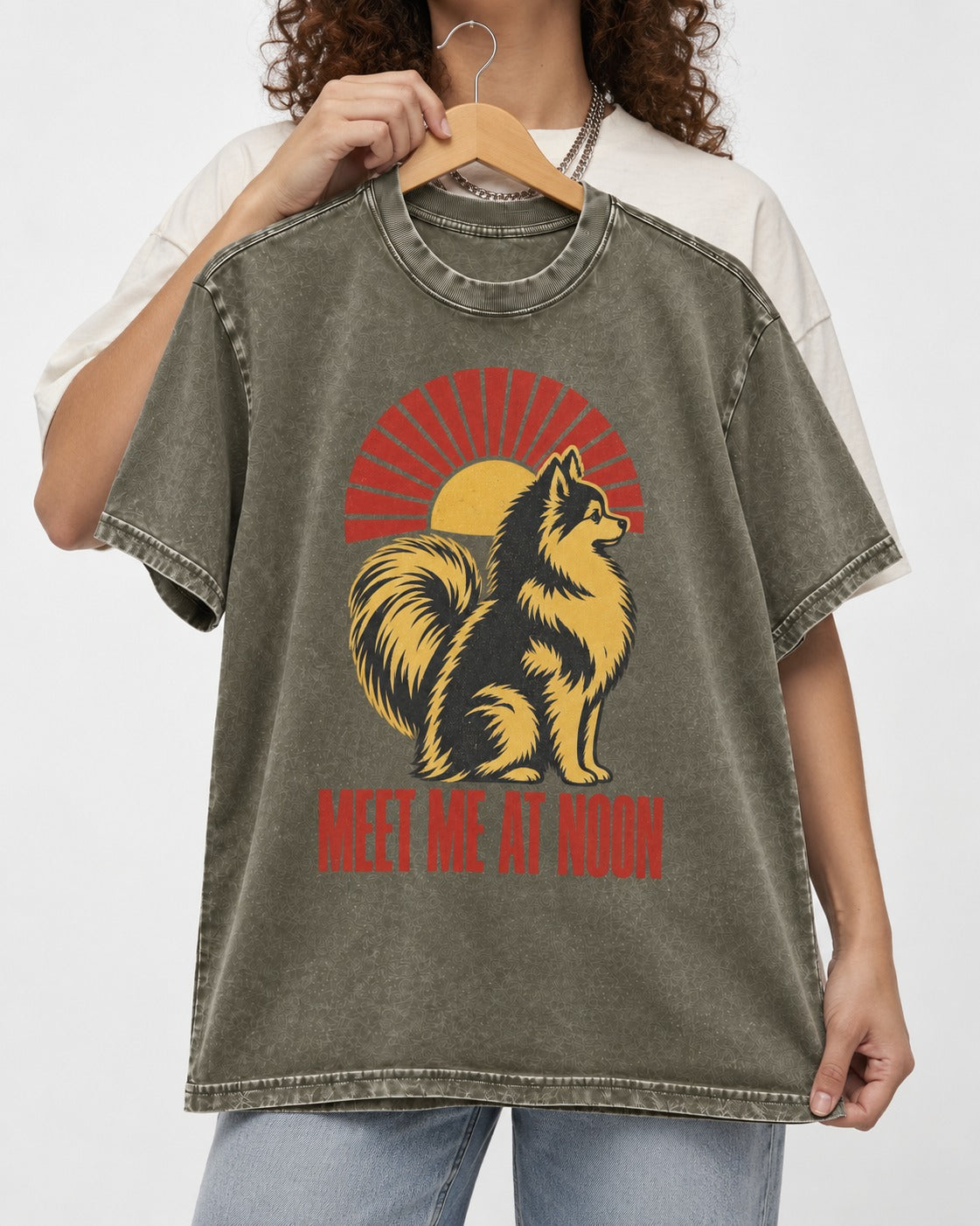 Pomeranian Meet Me at Noon Sunburst Graphic Washed Tee in Army Green, held up on a hanger
