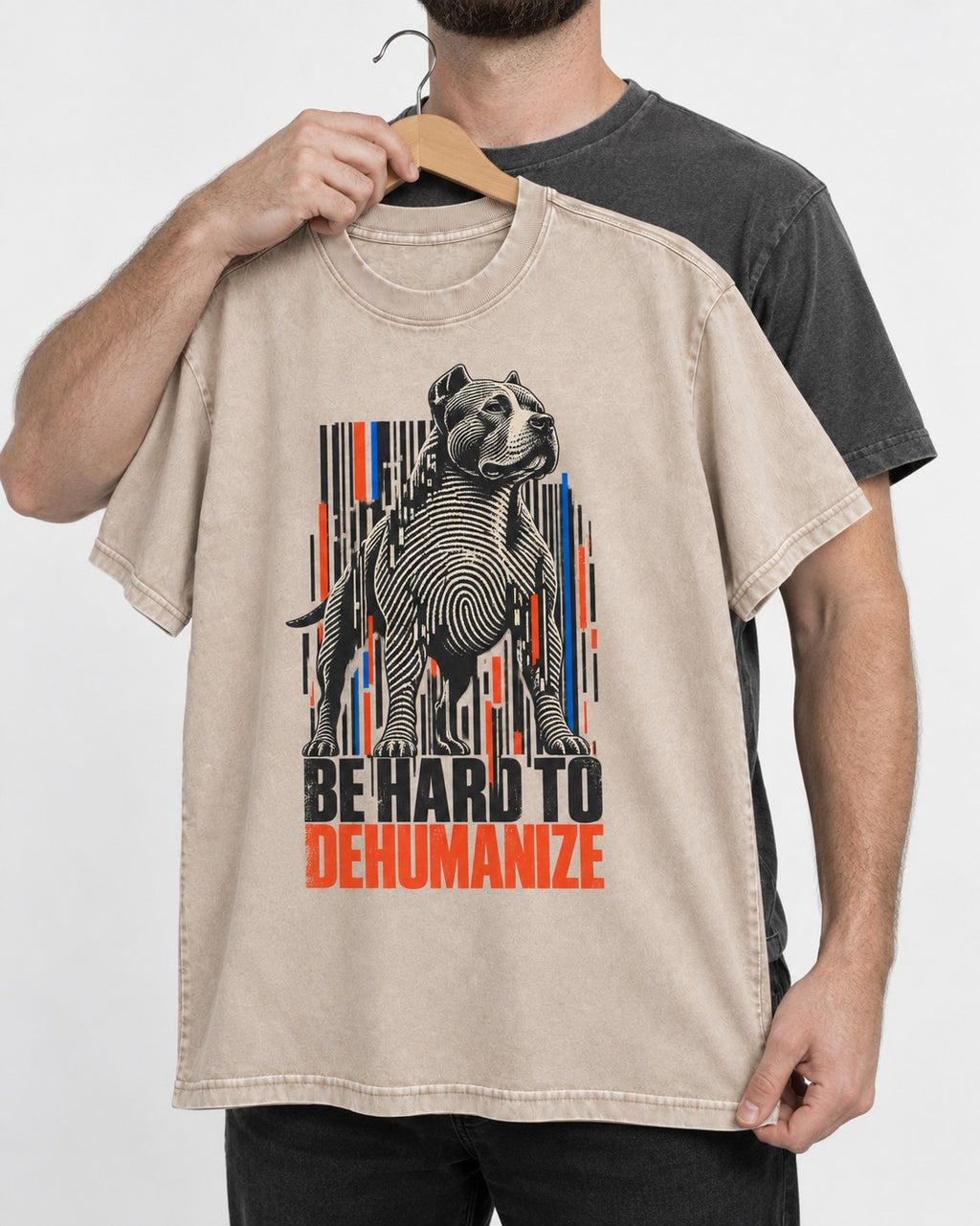 Pitbull Hard to Dehumanize Washed Tee in Apricot, held up on a hanger
