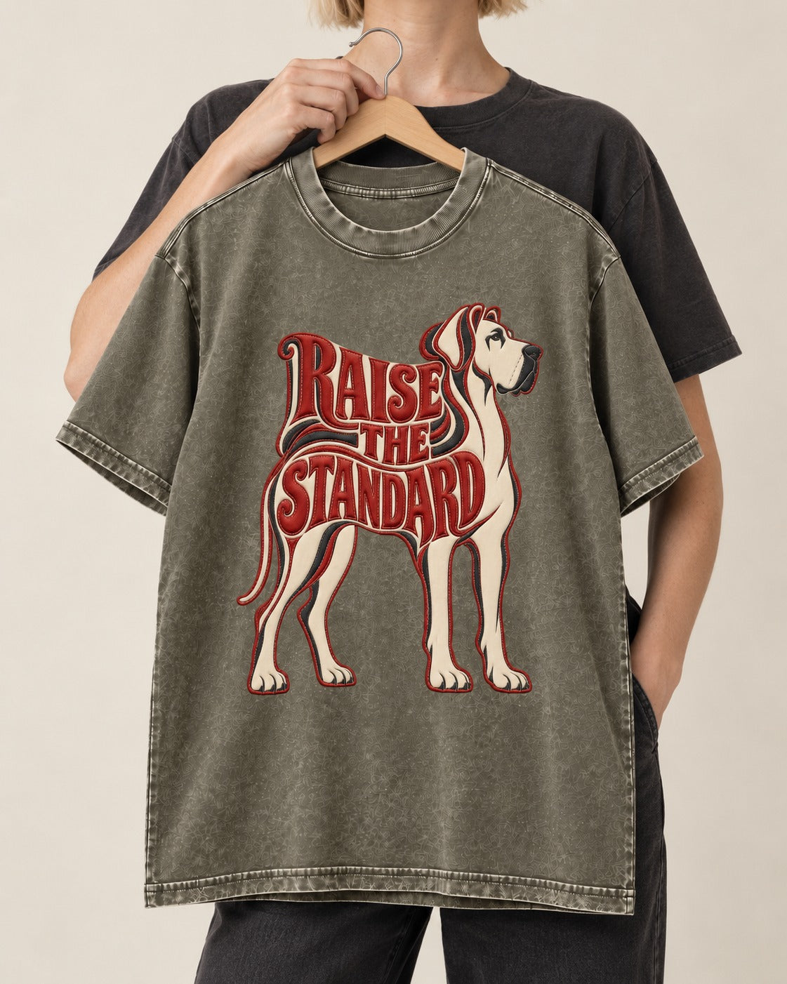Great Dane Raise the Standard Typography Graphic Washed Tee in Army Green, held up on a hanger