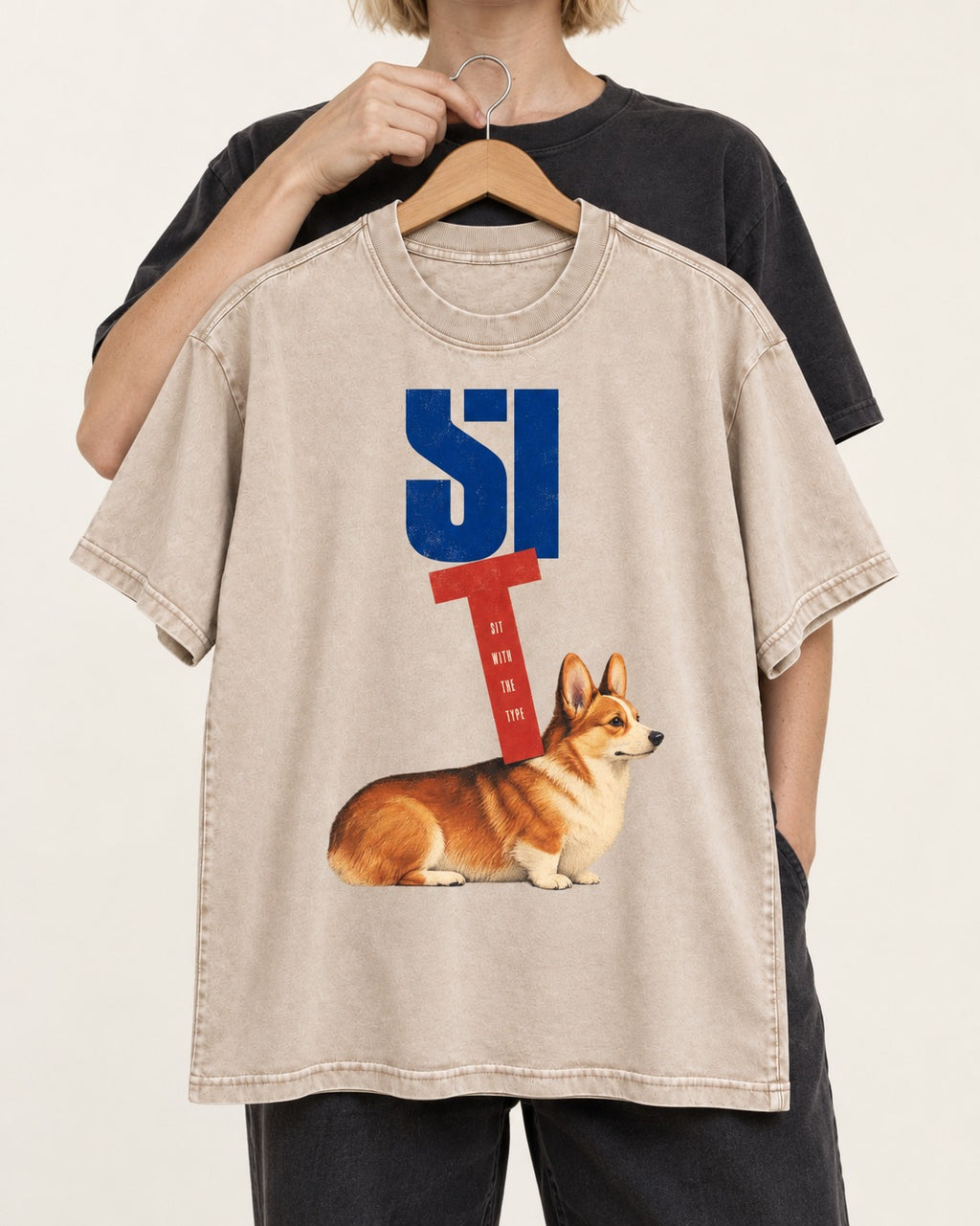 Sit with the Corgi Washed Tee in Apricot, held up on a hanger
