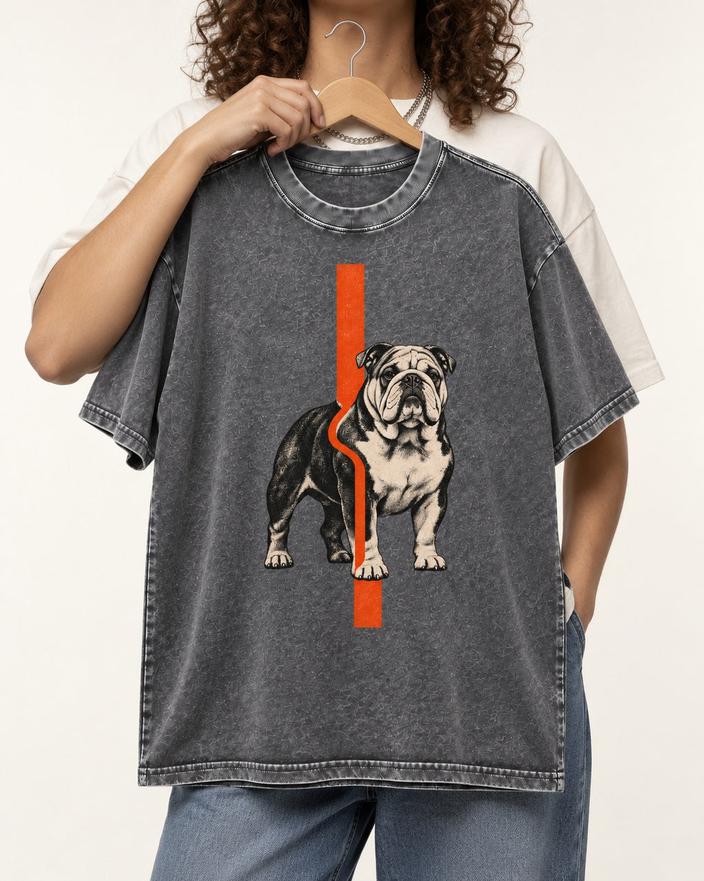English Bulldog Quiet Strength Washed Tee in Gray, held up on a hanger
