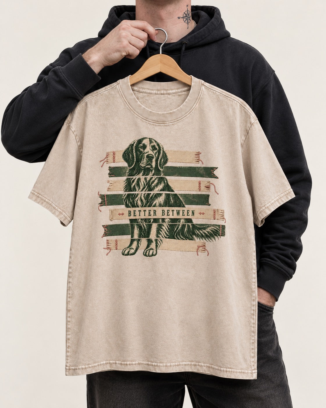 Golden Retriever Better Between Washed Tee in Apricot, held up on a hanger