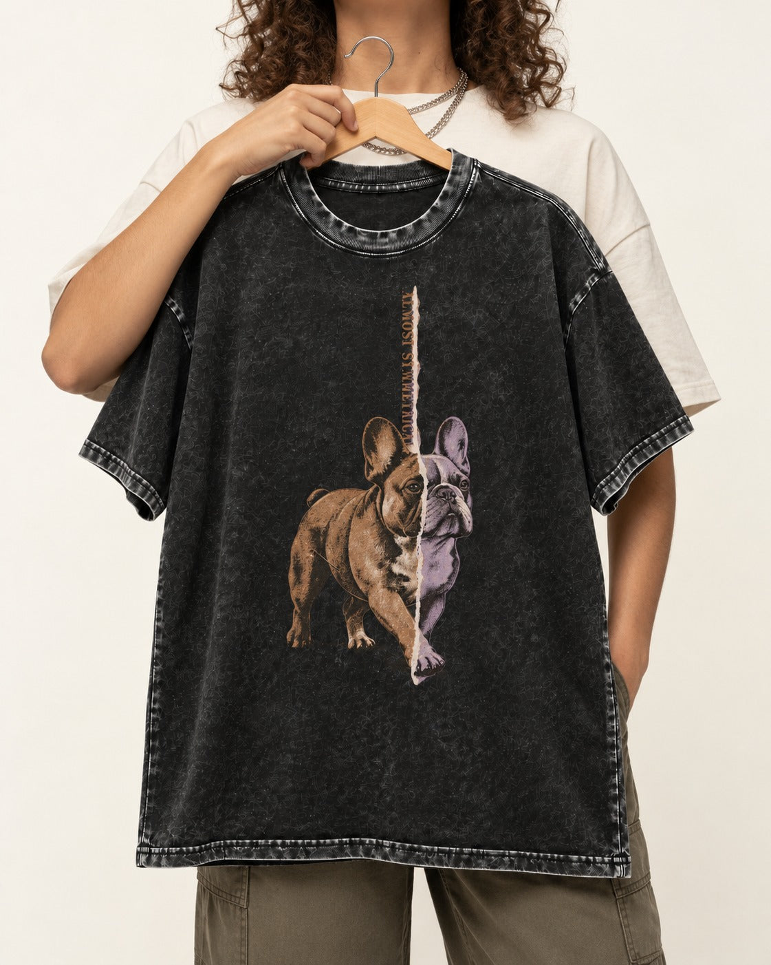 Frenchie Almost Symmetrical Torn Split Graphic Washed Tee in Black, held up on a hanger