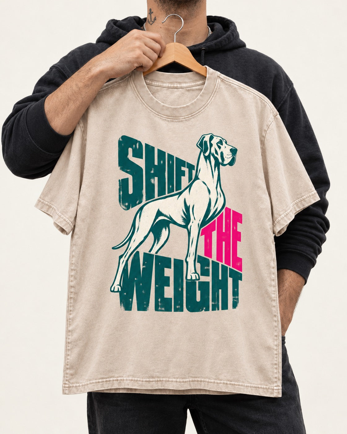 Great Dane Shift the Weight Standing Graphic Washed Tee in Apricot, held up on a hanger