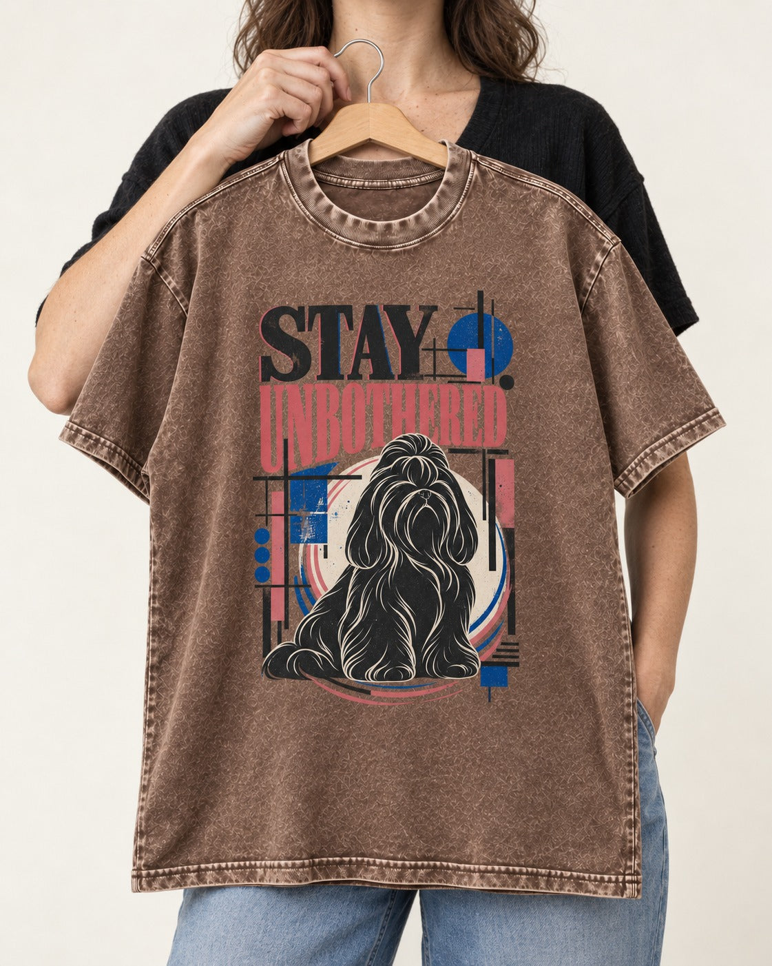 Stay Unbothered Shih Tzu Washed Tee in Coffee, held up on a hanger