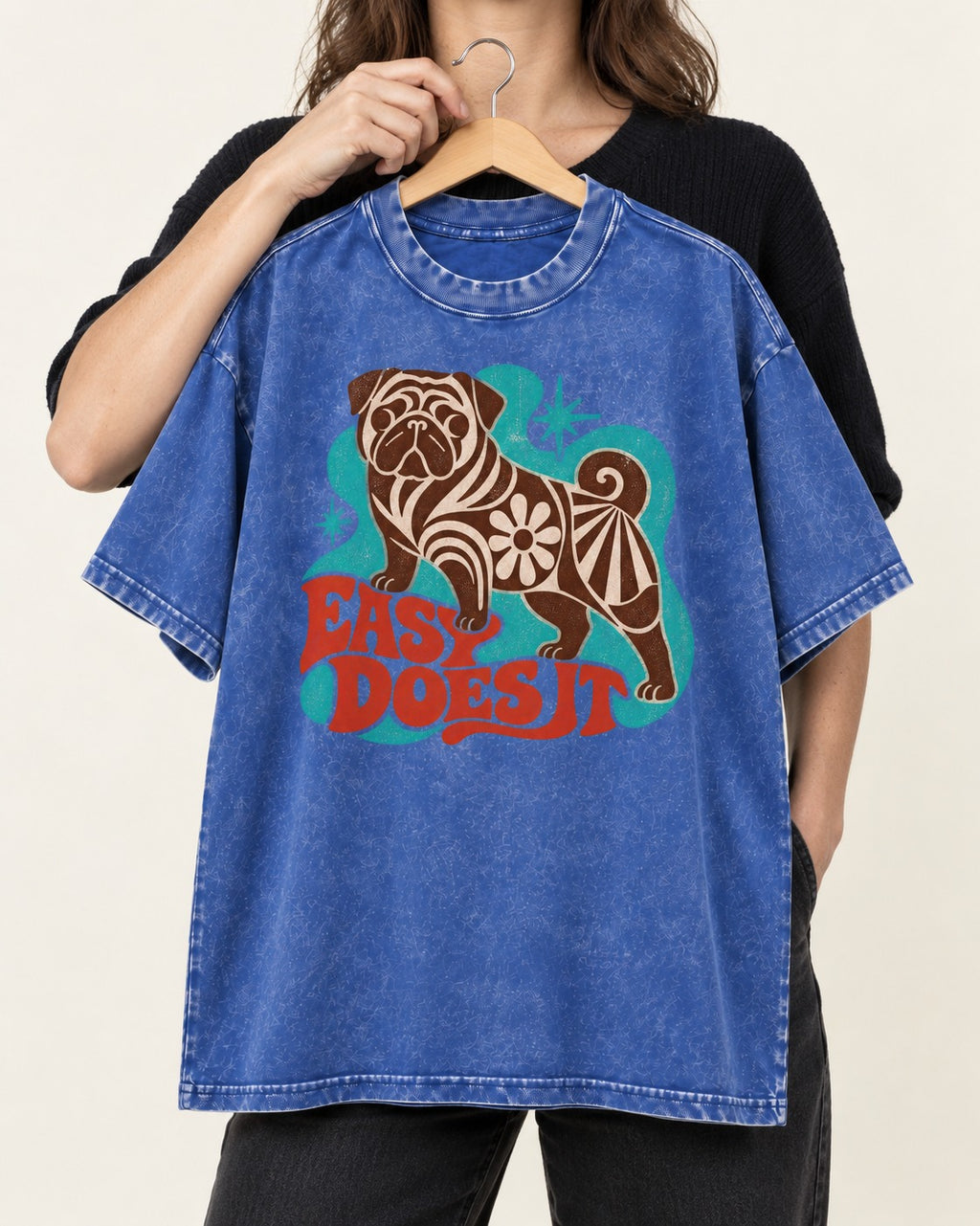 Pug Easy Does It Retro Floral Graphic Washed Tee in Royal Blue, held up on a hanger
